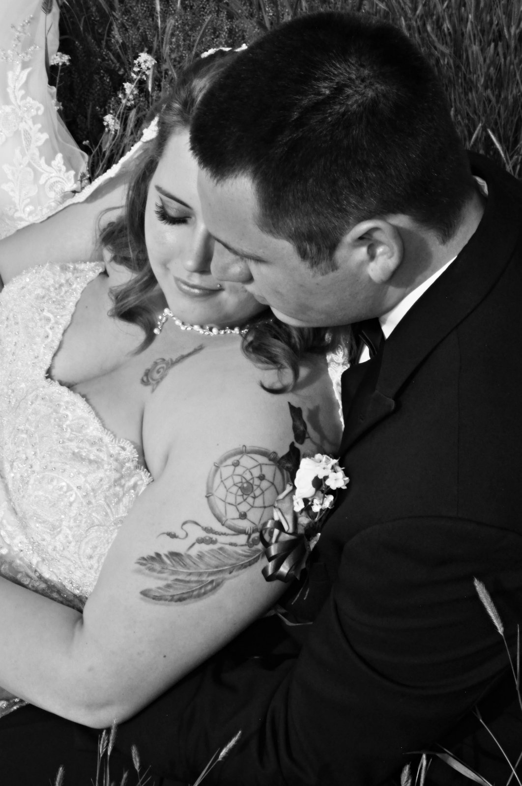Intimate couple portrait in tall grass